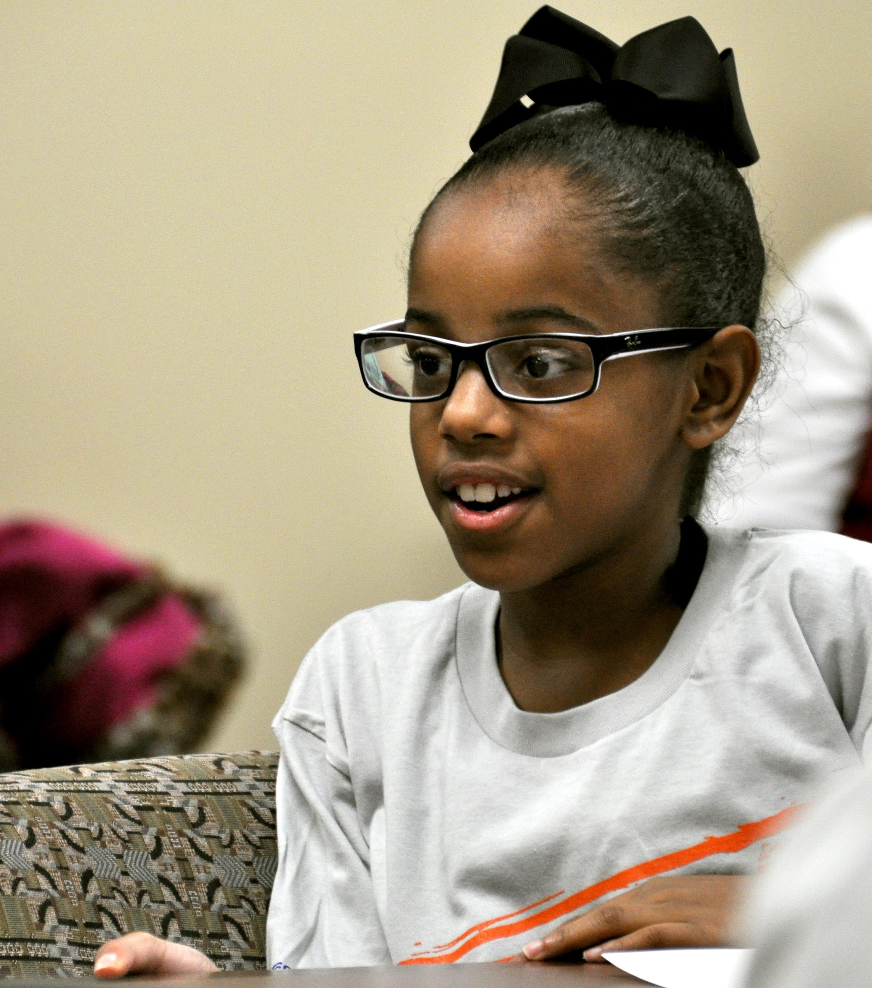 Anayah Meyer, a student at Bright Star Elementary in Douglasville, Ga. asks Maj. Gen. Stayce Harris, 22nd Air Force commander, a question at the 22nd AF headquarters at Dobbins Air Reserve Base, Ga., Feb. 7, 2015. Ten students from Bright Star visited the installation to interview Harris for Black History month. (U.S. Air Force photo/Senior Airman Daniel Phelps)
