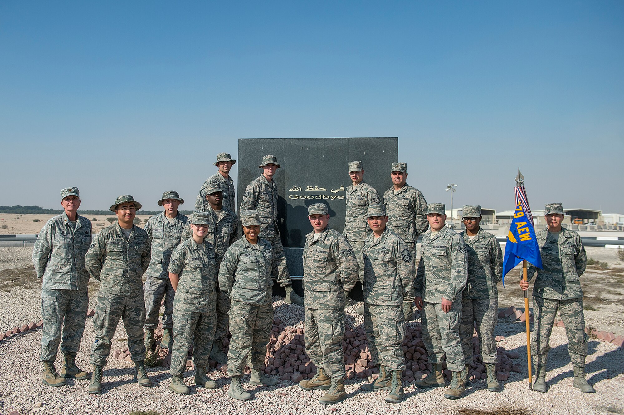 Staff Sgt. Brett Daniel (third from right in front row) and the 379th Expeditionary Comptroller Squadron pose for their final photo together before leaving Al Udeid Air Base, Qatar where Daniel worked six days a week for four months as a cashier. He made sure service members were financially stress free so they could focus on the mission. (Photo courtesy of Staff Sgt. Brett Daniel) 