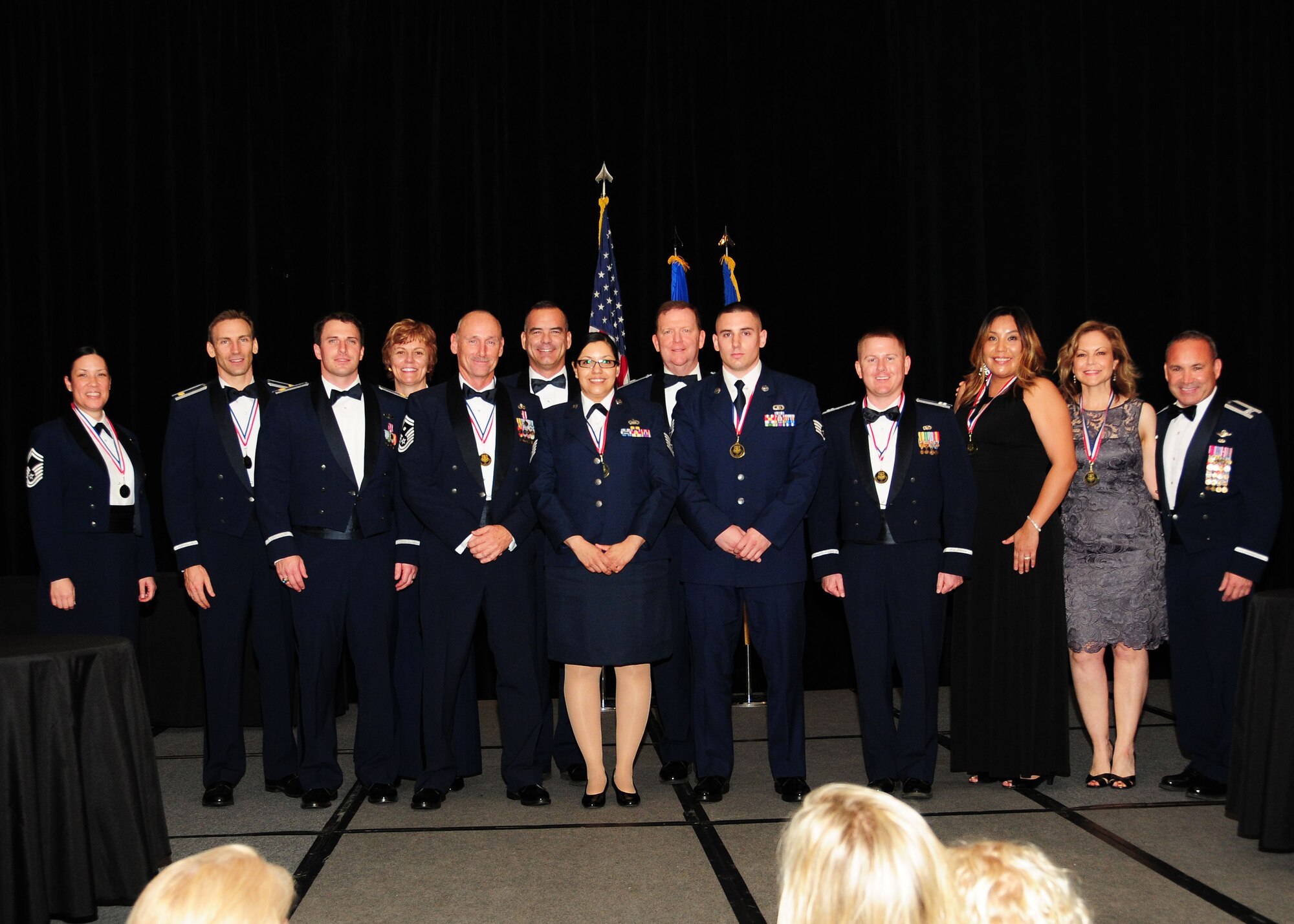 944th Fighter Wing 2014 Annual Award Winners pose for a group photo Feb 7 during a banquet honoring them at the Wigwam Resort, Ariz. (U.S. Air Force photo taken by Tech. Sgt. Louis Vega Jr.)