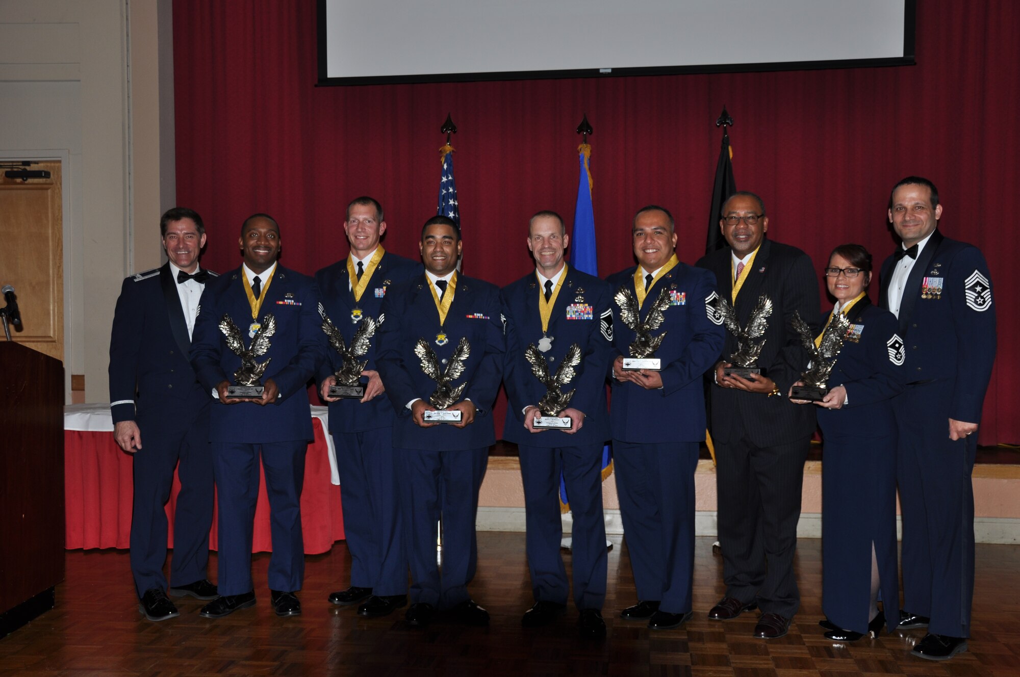 Left to Right: 433rd Airlift Wing, Category I, Outstanding Civilian of the Year, Lloyd J. Watkins, Jr., 433rd Civil Engineer Squadron; CAT II, Civilian of the Year, Shane MacDonald, 433rd Civil Engineer Squadron; CAT III, Outstanding Civilian of the Year, Stephen Knight, 733rd Training Squadron; Noncommissioned Officer of the Year, Staff Sgt. Richard Slifer, Jr., 433rd Maintenance Squadron; Airman of the Year, Senior Airman Rikel Cifre-Ajarie, 433rd Aircraft Maintenance Squadron; Senior Noncommissioned Officer of the Year, Master Sgt. Joe Gonzalez, Jr., 26th Aerial Port Squadron; First Sergeant of the Year Award, Senior Master Sgt. Diana Marlette, 26th Aerial Port Squadron. (U.S. Air Force by Tech. Sgt. Carlos J. Trevino)