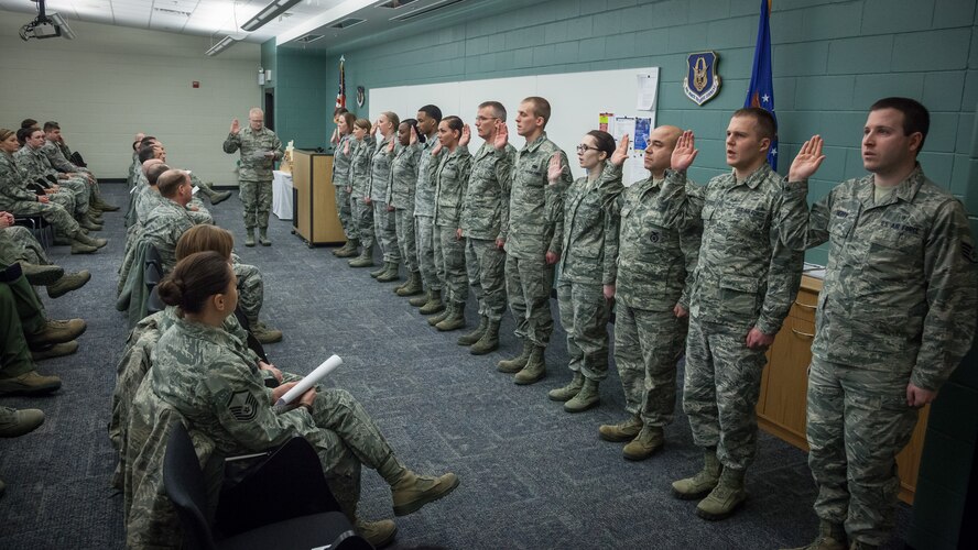 Newly promoted Staff Sergeants within the 934th Airlift Wing recite the Non-Commissioned Officer Oath as they are recognized in a ceremony Saturday at the Minneapolis-St. Paul Air Reserve Station, Minn. (U.S. Air Force photo by Shannon McKay/Released)