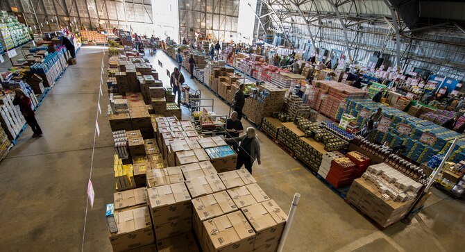 The Eglin Air Force Base commissary hosted a case lot sale on Duke Field, Fla., Feb. 6. Patrons waited in line for at least 30 minutes to receive the special sales prices. The case lot sale was open to military, retirees, and their family members. (U.S. Air Force photo/Tech. Sgt. Cheryl L. Foster)