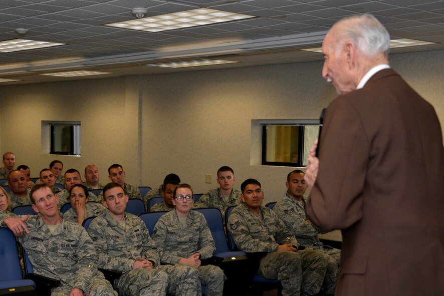 U.S. Air Force Lt. Col. (ret.) B.A. Hansen speaks to Airmen assigned to the 144th Fighter Wing during the Wing Heritage Event Feb. 7. Hansen shared stories about his early years before joining the Air Force and shared his experiences about his career as a pilot (Air National Guard photo by Senior Airman Klynne Pearl Serrano)