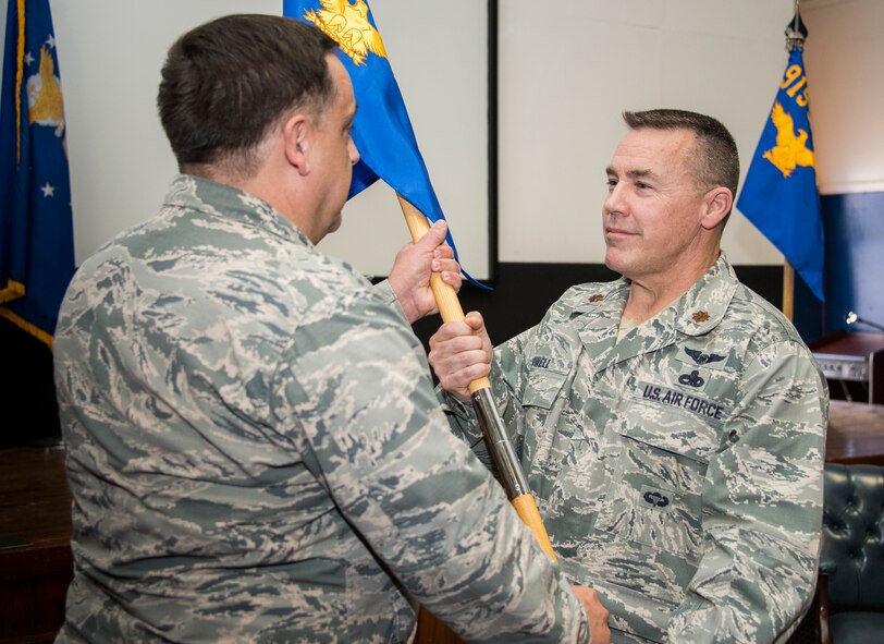 Maj. Jeff Powell accepts the 919th Special Operations Maintenance Squadron guidon during his assumption of command ceremony Feb. 7 at Duke Field, Fla.  (U.S. Air Force photo/Tech. Sgt. Cheryl Foster)