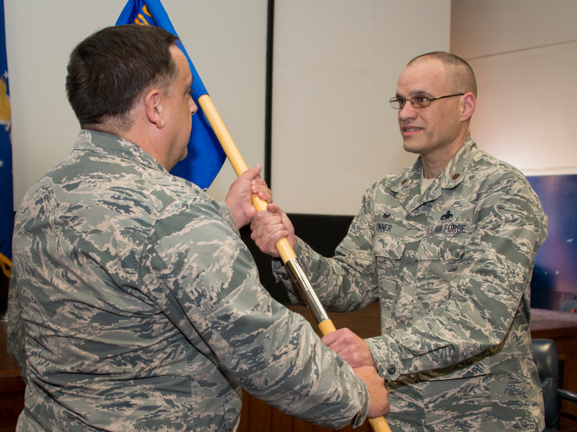 Maj. Terrell Eikner accepts the 919th Special Operations Aircraft Maintenance Squadron guidon during his assumption of command ceremony Feb. 7 at Duke Field, Fla.  (U.S. Air Force photo/Tech. Sgt. Cheryl Foster)