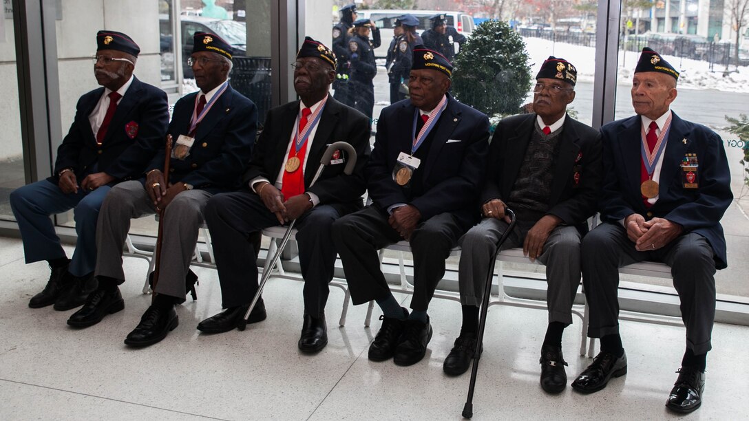 Surviving Montford Point Marines attend a ceremony for Sgt. Hiram L. Knowles to be awarded the Congressional Gold Medal on Feb. 7, 2015. Knowles was one of over 400 Montford Point Marines to be awarded since 2012. 