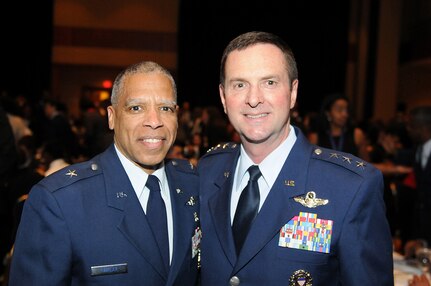 Air Force Brig. Gen. David Hamlar, assistant adjutant general, Minnesota Air National Guard, receives the Black Engineer of the Year Award at the 10th Annual Stars & Stripes Dinner, Washington, D.C., Feb. 6, 2015, from Air Force Lt. Gen. Joseph Lengyel, vice chief, National Guard Bureau. 