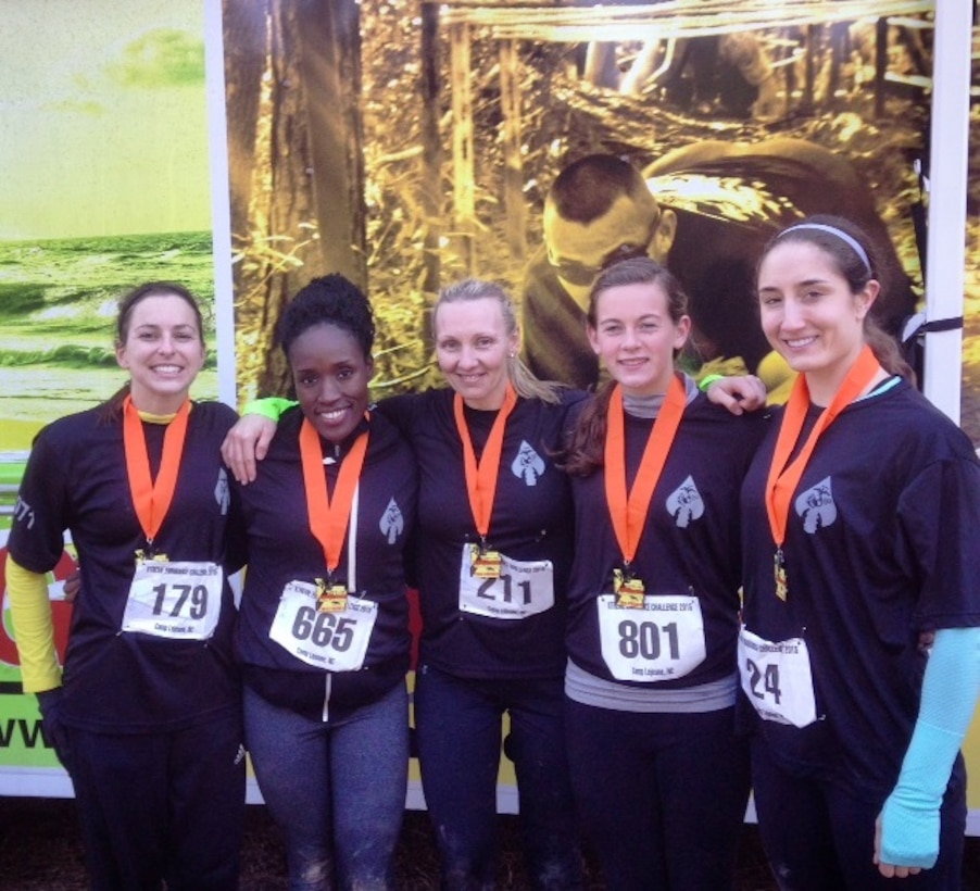 (Left to right) Unidentified; Staff Sgt. Mona Thomas, embarkation chief, Marine Special Operations Support Group; Capt. Christie Everett, adjutant, MSOSG; Ms. Lexi McLellan; 2nd Lt. Kelsey Baker, logistics officer, 2d Marine Special Operations Support Battalion, won first place in the female team division of the Marine Corps Community Services’ 10K Extreme Endurance Challenge, at Camp Devil Dog, N.C., Feb. 7. Some of the women also had individual achievements. Capt. Everett placed first, Ms. McLellan placed second, and 2nd Lt. Baker placed second in their respective age groups.