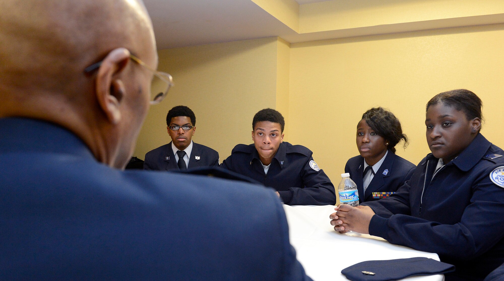 Air Force Vice Chief of Staff Gen. Larry O. Spencer speaks with a small group of high school students during the 29th Black Engineer of the Year Award Science, Technology, Engineering and Science Conference Feb. 5, 2015, in Washington, D.C. During the conference, Spencer and several general officers and senior executive service members led small mentorship groups. (U.S. Air Force photo/Scott M. Ash)