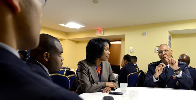 Air Force Vice Chief of Staff Gen. Larry O. Spencer, right, and Steffanie B. Easter talk with a small group of high school students during the 29th Black Engineer of the Year Award Science, Technology, Engineering and Science Conference Feb. 5, 2015, in Washington, D.C. During the conference, Spencer and several general officers and senior executive service members led small mentorship groups. Easter is the executive director of the F-35 Lightning II Joint Program Office. (U.S. Air Force photo/Scott M. Ash)