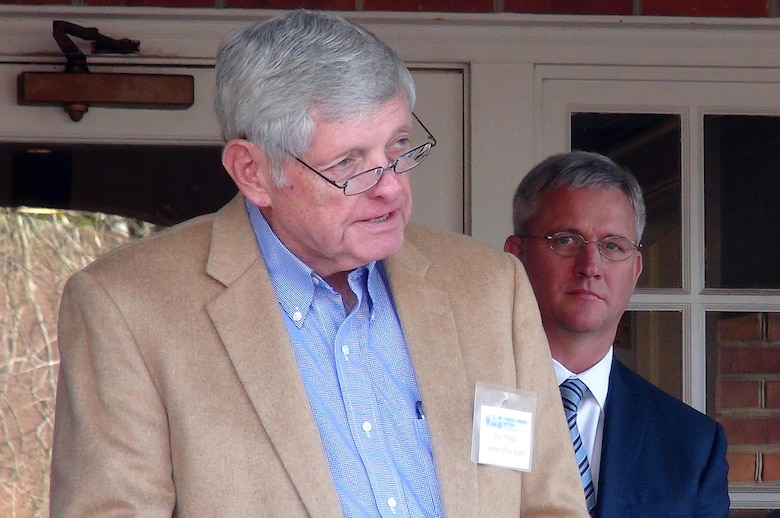 Bud Phillips, chairman of the Tennessee-Tombigbee Waterway Transportation Museum Board of Directors, welcomes dignitaries and guests to the dedication of the museum in Columbus, Miss., Feb. 6, 2015. 