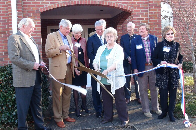 Dignitaries cut the ribbon to dedicate the Tennessee-Tombigbee Waterway Transportation Museum in Columbus, Miss., Feb. 6, 2015. 