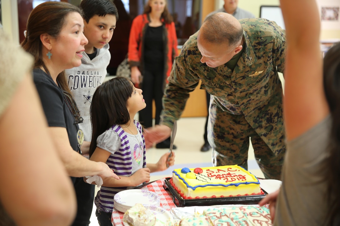 On Feb. 5, Marine Corps Logistics Base Barstow, Calif., held a ribbon cutting ceremony for the grand opening of the newly built School-Age Care Center. The ceremony included the base commanding officer, Col. Michael L. Scalise, assisting children in the ribbon cutting, a tour of the facility given by the children followed by cake. The SAC provides care before and after school to children while their parents are at work. 
