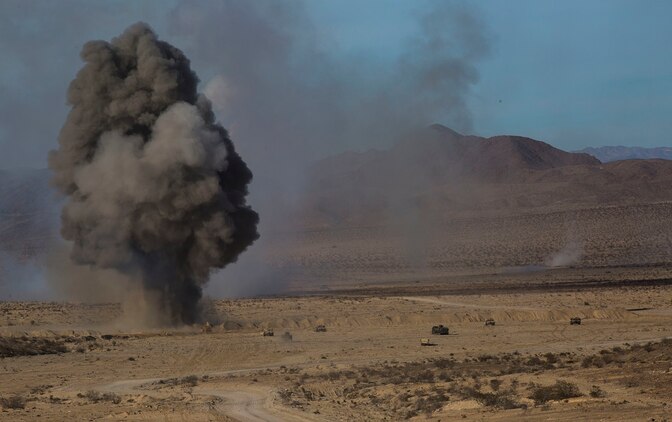Marines uses an M1 Assault Breacher Vehicle to fire a Mine-Clearing Line Charge to clear an area for Marines to continue their assault Jan. 2 at Marine Air Ground Combat Center Twentynine Palms during the Integrated Training Exercise 2-15 Tank Mechanized Assault Course. The MICLIC uses over 1,700 pounds of composition C-4 to clear paths for tanks and other vehicles through dangerous terrain. The Marines operating the M1ABV are with 2nd Combat Engineer Battalion, 2nd Marine Division, II Marine Expeditionary Force. 
