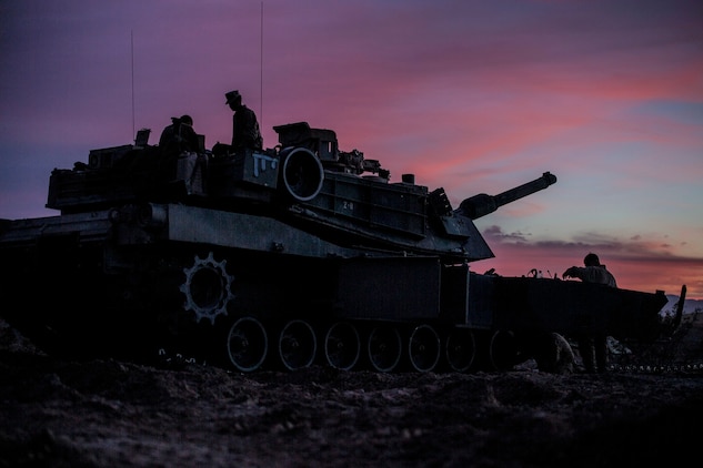 Marines perform maintenance on their M1A1 Abrams Main Battle Tank Feb. 1 at Marine Air Ground Combat Center Twentynine Palms before the Tank Mechanized Assault Course. The TMAC allows Marines to train with different elements within the Marine Air-Ground Task Force and integrate fires for a combined arms assault. The Marines are with Company D, 1st Tank Battalion, 1st Marine Division, I Marine Expeditionary Force. 
