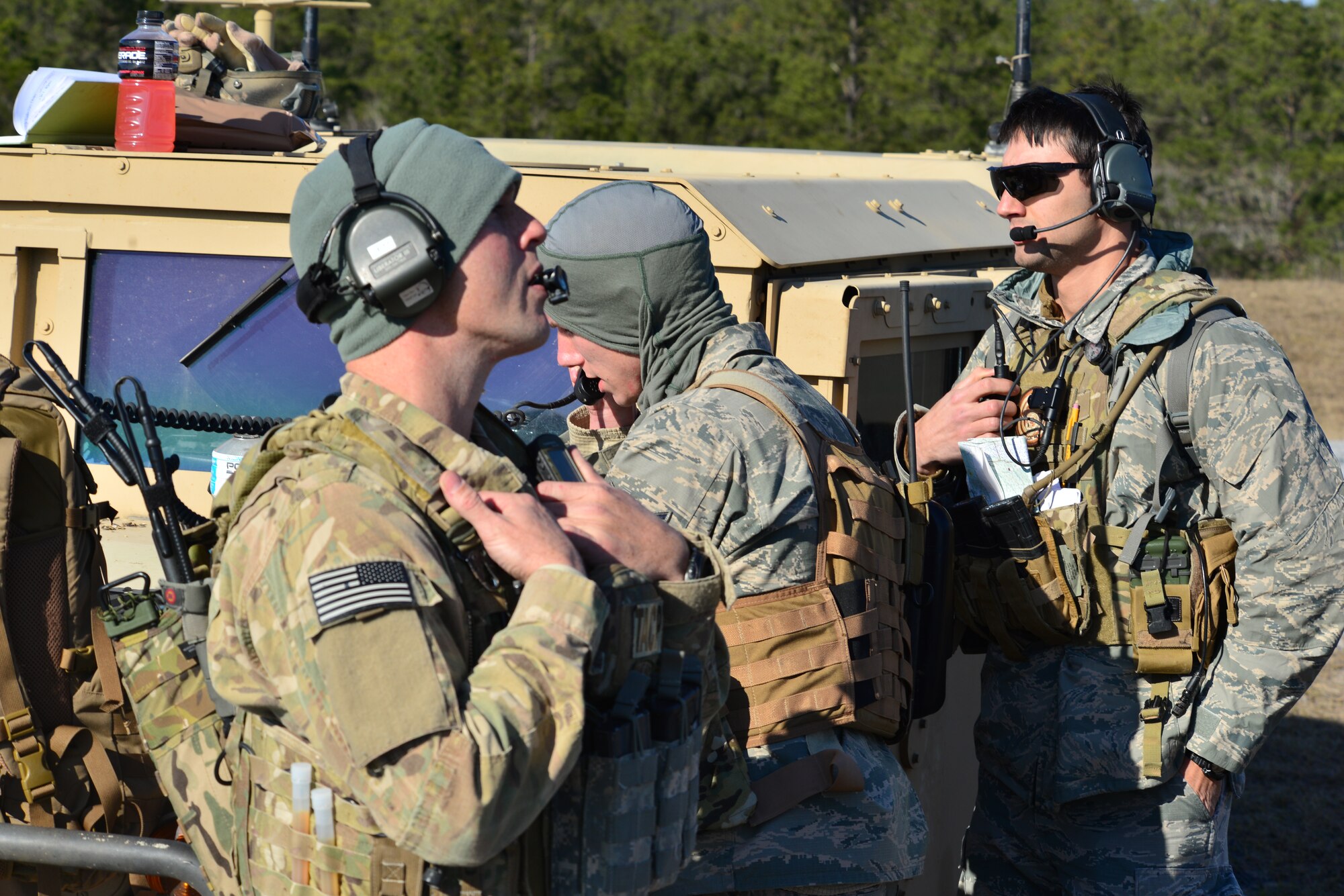 Joint terminal attack controllers coordinate an air strike during a Green Flag East exercise on on Fort Polk La., Jan. 16, 2015. The JTACs made up a Tactical Air Control Party and interacted with A-10 thunderbolt II pilots, from Moody Air Force Base, La., who provided close air support and the ability attack anything from enemy personnel to heavily armored vehicles. (U.S. Air Force photo/Airman 1st Class Mozer O. Da Cunha)