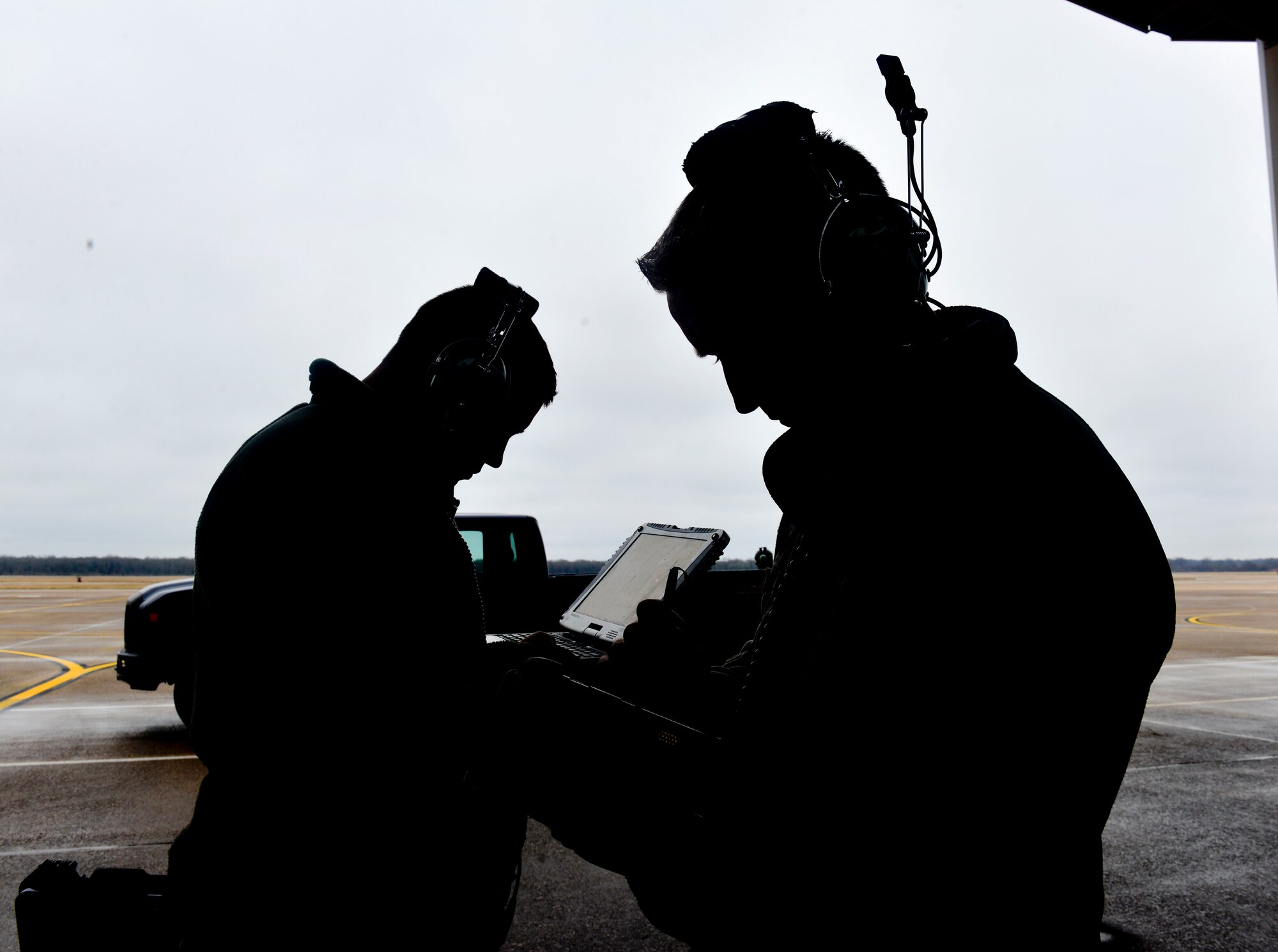 Staff Sgt. Ronald Steinhelfer and Tech. Sgt. Aaron Williams, 23rd Aircraft Maintenance Squadron avionics system technicians off Moody Air Force Base, Ga., Load the OFP into the A-10 thunderbolt II central interstation control unit on Barksdale Air Force Base, La., Jan. 12, 2015. (U.S. Air Force photo/Airman 1st Class Mozer O. Da Cunha)