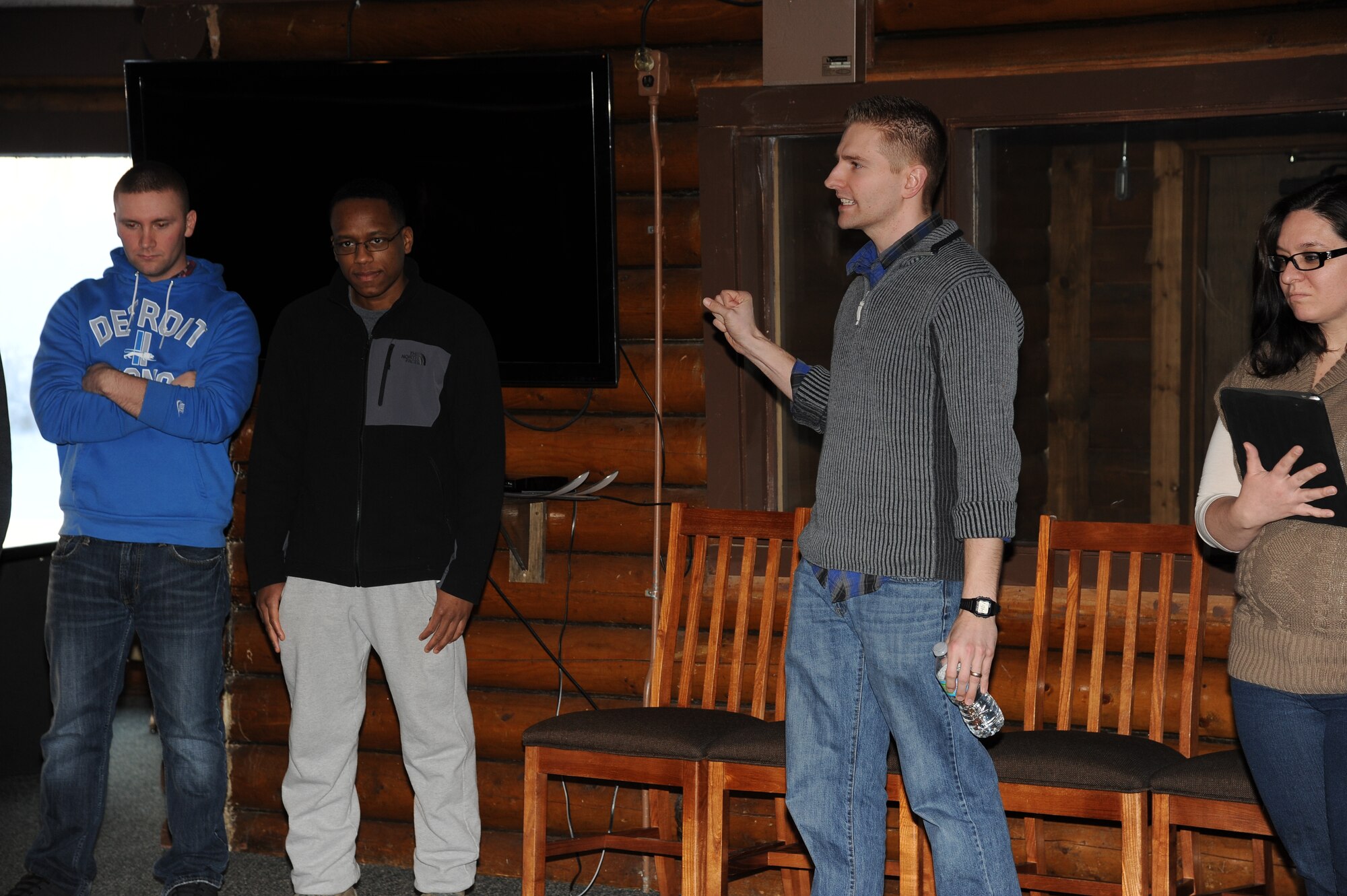 Chaplain (Capt.) Philip Vincent, 354th Fighter Wing chaplain, discusses the challenges of communication with Airmen during a day-long retreat Feb. 6, 2015, Eielson Air Force Base, Alaska. The retreat provided Airmen with interactive discussion, exercises and team building activities to encourage personal and professional growth and development. (U.S. Air Force photo by Staff Sgt. Kirsten Wicker/Released)