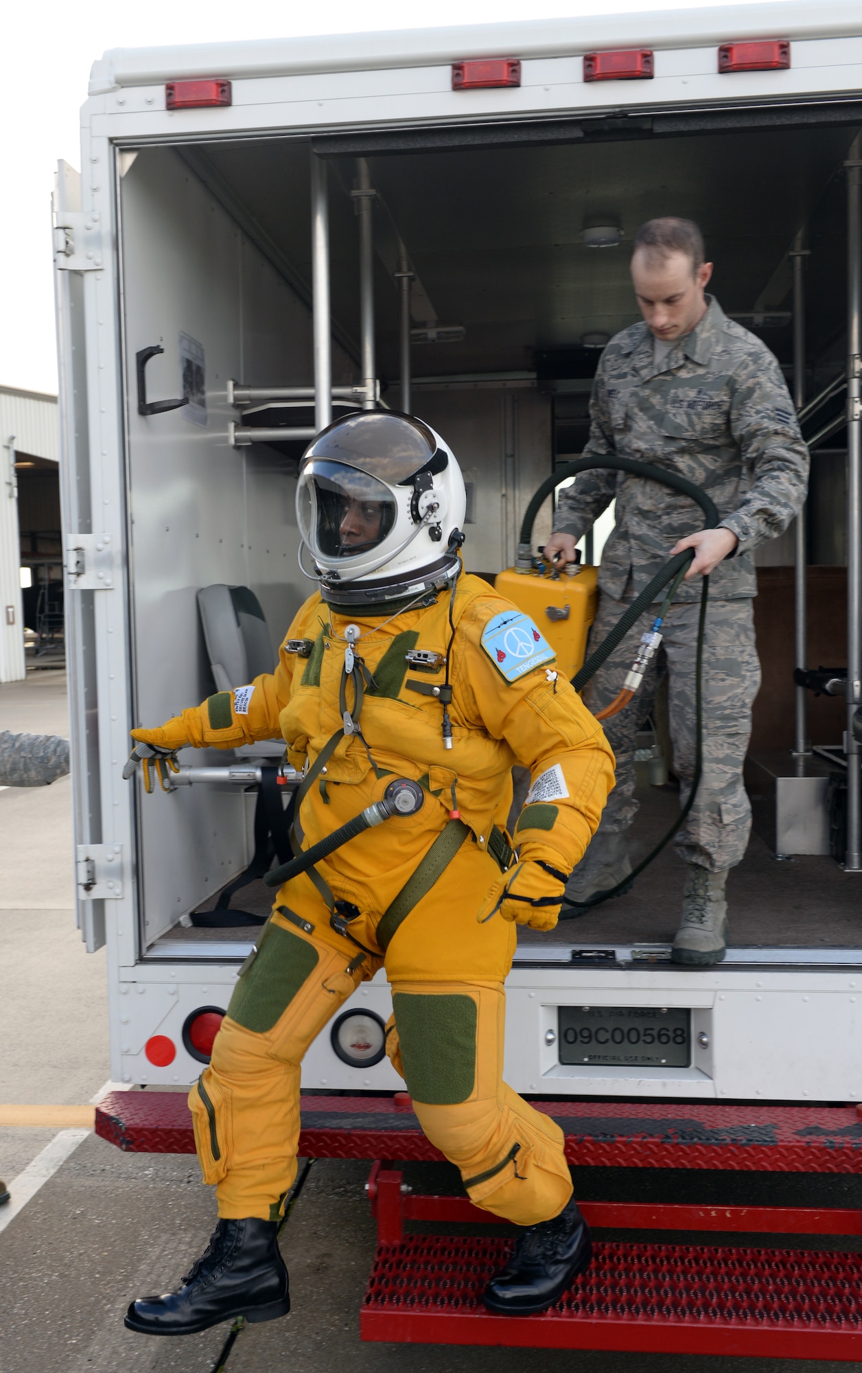 Lt. Col. Merryl Tengesdal, 9th Reconnaissance Wing inspector general and U-2 Dragon Lady pilot, exits a vehicle onto the flight line Feb. 9, 2015, at Beale Air Force Base, Calif. Tengesdal is the only black female U-2 pilot in history. (U.S. Air Force photo by Senior Airman Bobby Cummings/Released)
