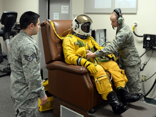 Lt. Col. Merryl Tengesdal, 9th Reconnaissance Wing inspector general and U-2 Dragon Lady pilot, undergoes a full pressure suit maintenance check by Airmen from the 9th Physiological Support Squadron Feb. 9, 2015, at Beale Air Force Base, Calif. Tengesdal is the only black female U-2 pilot in history. (U.S. Air Force photo by Senior Airman Bobby Cummings/Released)