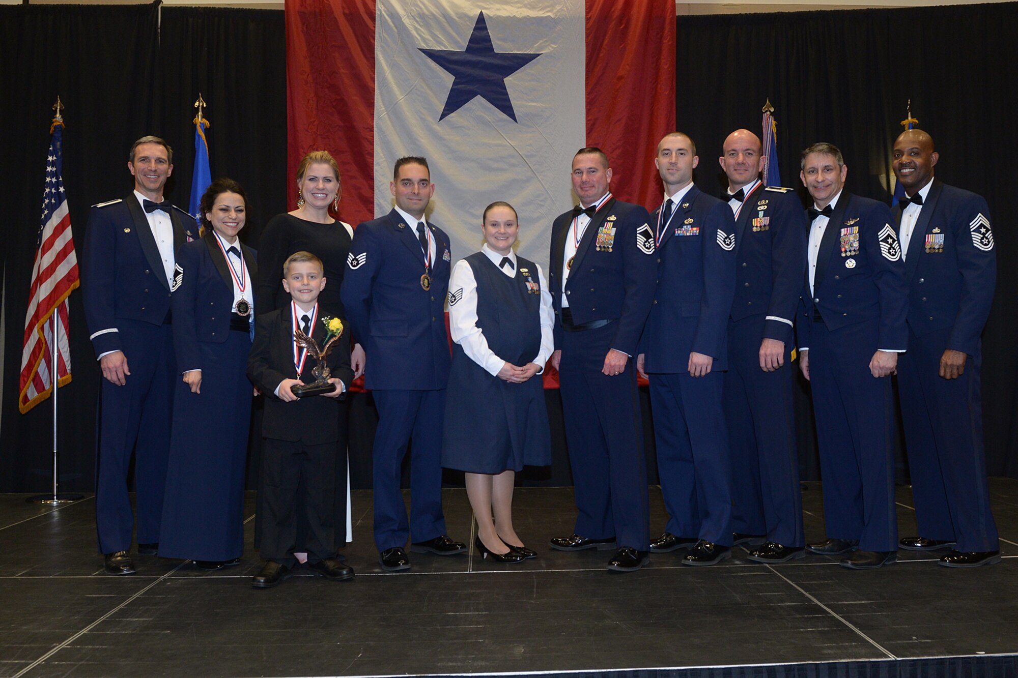 Winners of the 419th Fighter Wing’s Airmen of the Year banquet pose with wing and Air Force Reserve Command leadership Feb. 8. (U.S. Air Force photo/Alex Lloyd)