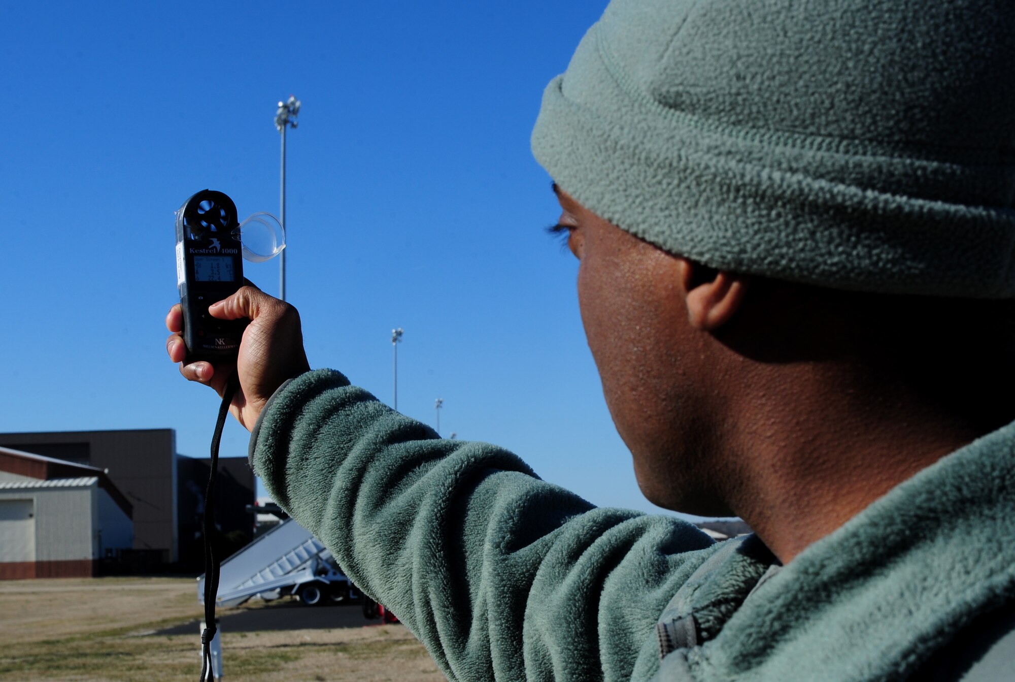 U.S. Air Force Tech. Sgt. Tyrome Conyers, 1st Operations Support Squadron assistant section chief, uses a manual observation tool at Langley Air Force Base, Va., Feb. 6, 2015. Weather personnel use a Kestrel 4000 hand-held weather meter to monitor meteorological conditions including wind speed, temperature and atmospheric pressure. (U.S. Air Force photo by Airman 1st Class Areca T. Wilson/Released) 
