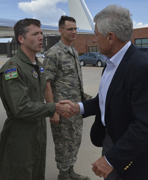 Maj. Derik George was “coined” by Secretary of Defense Chuck Hagel for his contributions to Modular Airborne Fire Fighting System missions on June 28, 2013. George was part of the MAFFS crew that was recently recognized with an Air Mobility Command safety award for their actions in August of 2014. (Courtesy photo)