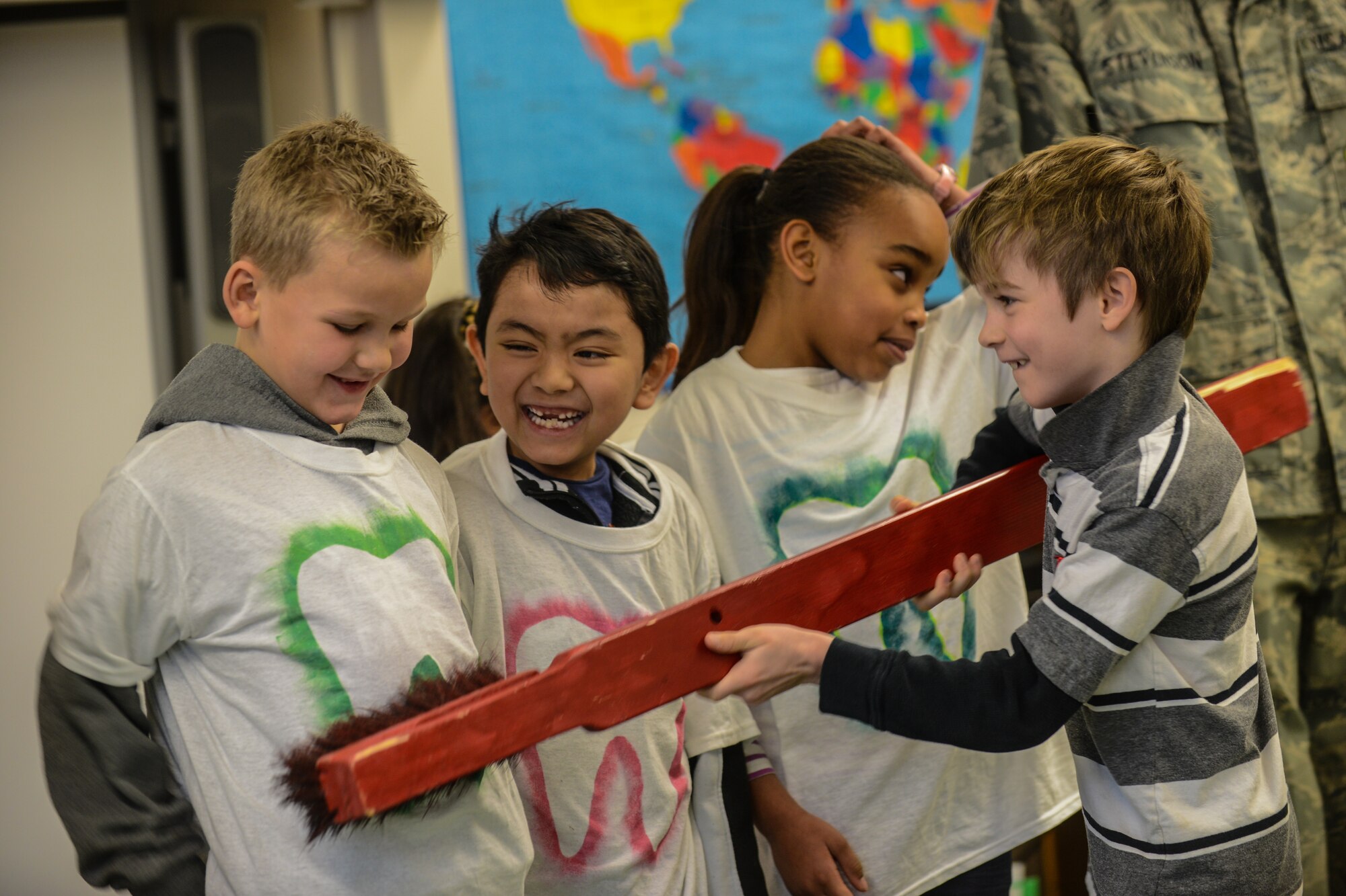 Ramstein Elemtary School students practice brushing their teeth during a dental hygiene presentation by the 86th Dental Squadron at Ramstein Air Base, Germany, Feb.  6, 2014. The dental team used examples such as flossing and brushing teeth, and talked about healthy eating and importance oral healthcare. (U.S. Air Force photo/Senior Airman Nicole Sikorski)