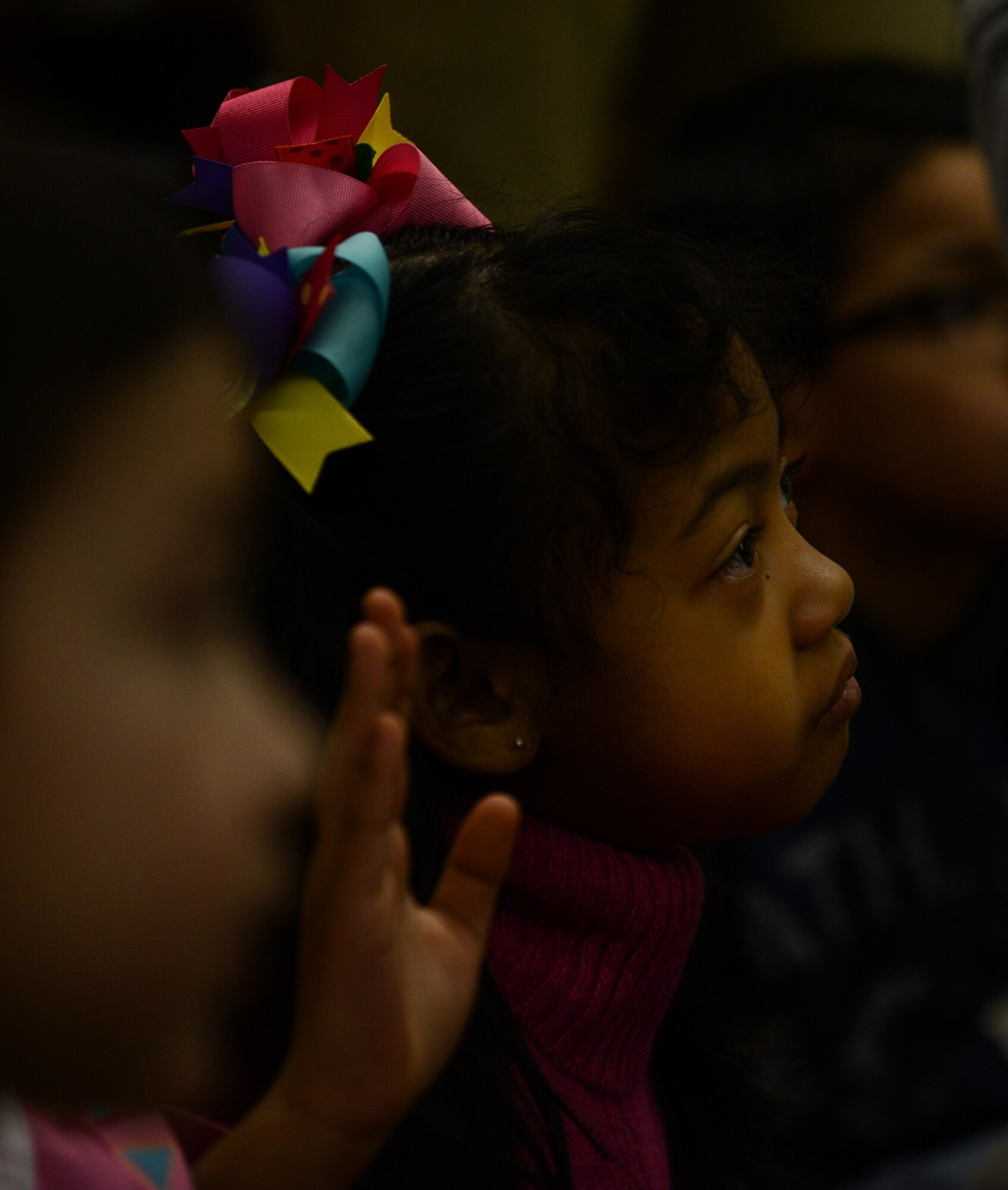 A student raises her hand during a dental hygiene presentation at Ramstein Air Base, Germany, Feb.  6, 2014. Airmen assigned to the 86th Dental Squadron visited Ramstein Elementary School to teach about dental health for Children’s Dental Health Month. (U.S. Air Force photo/Senior Airman Nicole Sikorski)