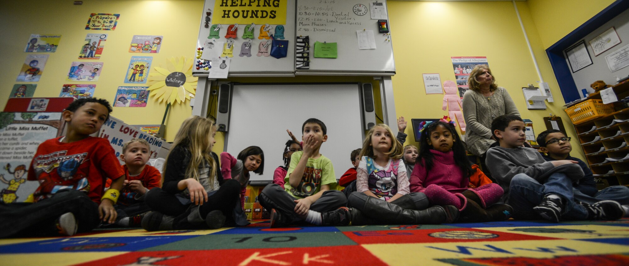Students at Ramstein Elementary School watch a dental hygiene presentation at Ramstein Air Base, Germany, Feb.  6, 2014. Airmen assigned to the 86th Dental Squadron conducted examples of how to properly care for your teeth and gums. (U.S. Air Force photo/Senior Airman Nicole Sikorski) 