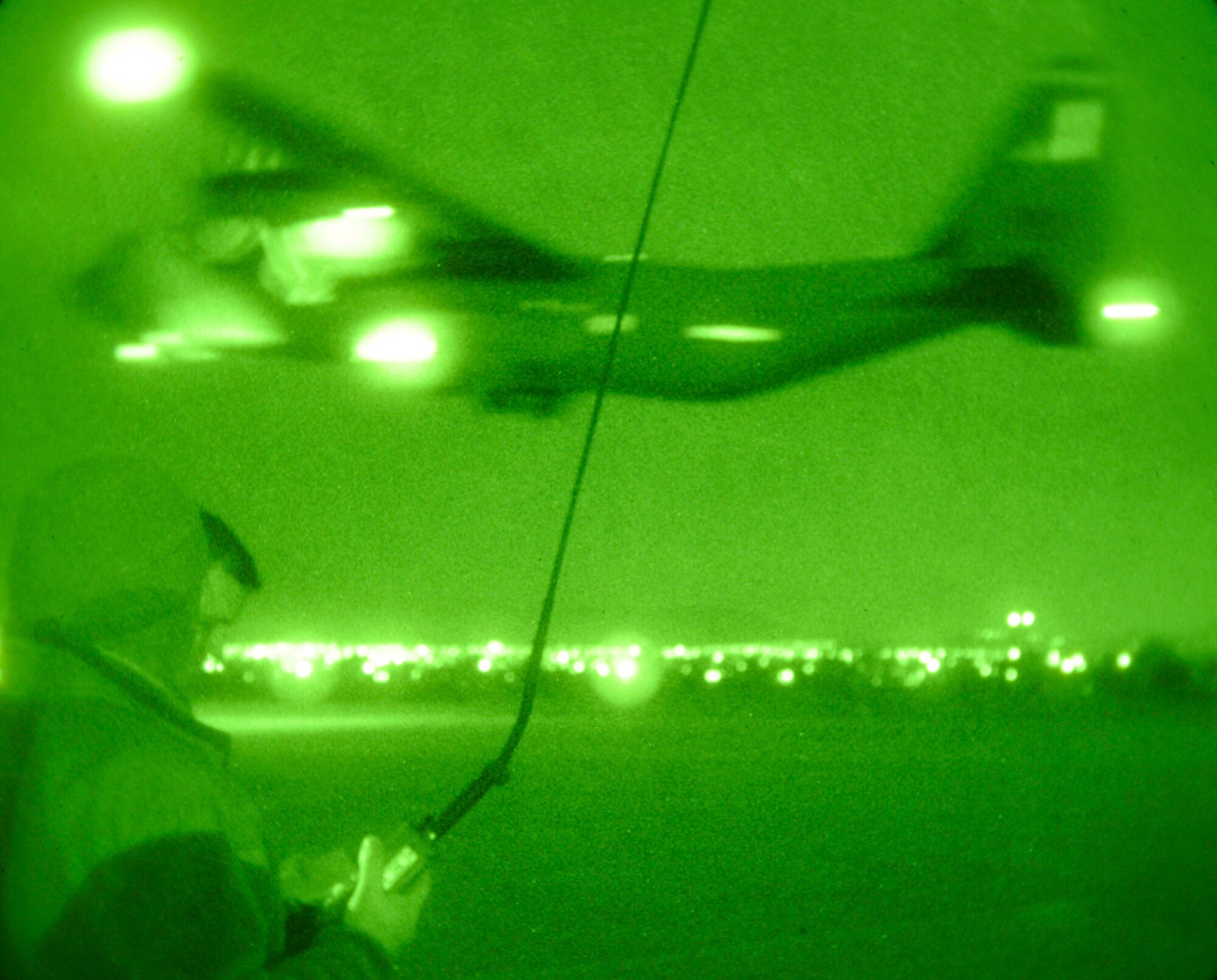 Tech. Sgt. George Broom, 435th Air Mobility Squadron contingency airfield manager, watches as a C-130J Super Hercules takes off of a runway in Elefsis, Greece, Feb. 5, 2015. The 435th Air Ground Operations Wing's Contingency Response Group is implementing a new landing zone program that will allow members of CRGs prepare landing zone operations from picking the location to actually providing limited air traffic control. (U.S. Air Force photo/Senior Airman Timothy Moore)
