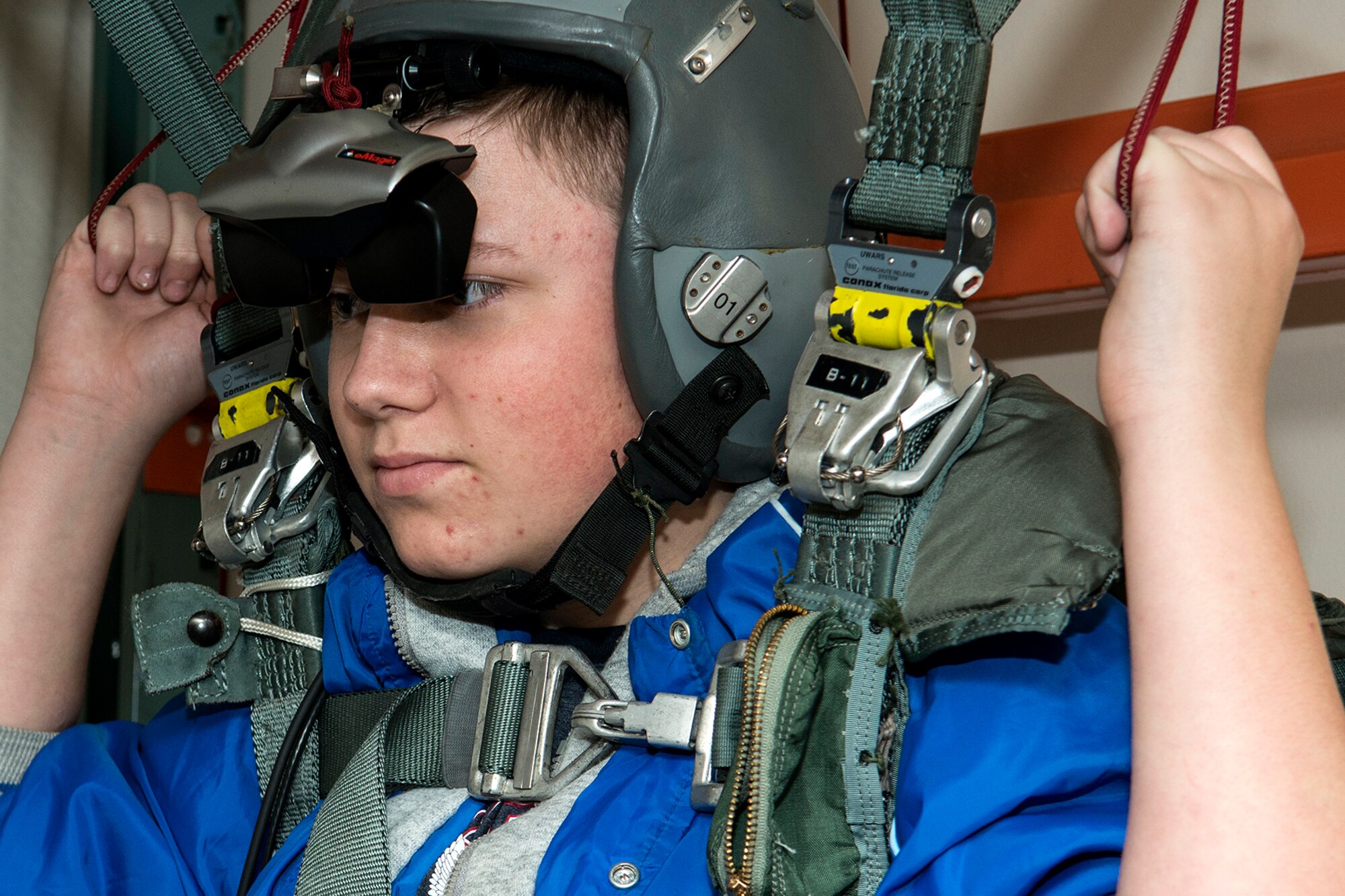 A Greenacres Middle School student is strapped into the virtual parachute trainer during a tour on Jan. 30, 2015, Barksdale Air Force Base, La. The student, who wants to be an Air Force pilot, participated in a "Shadow Day" and got a tour of the Air Force Reserve Command's 307th Bomb Wing to experience a day in the life of a B-52 pilot. (U.S. Air Force photo by Master Sgt. Greg Steele/Released)