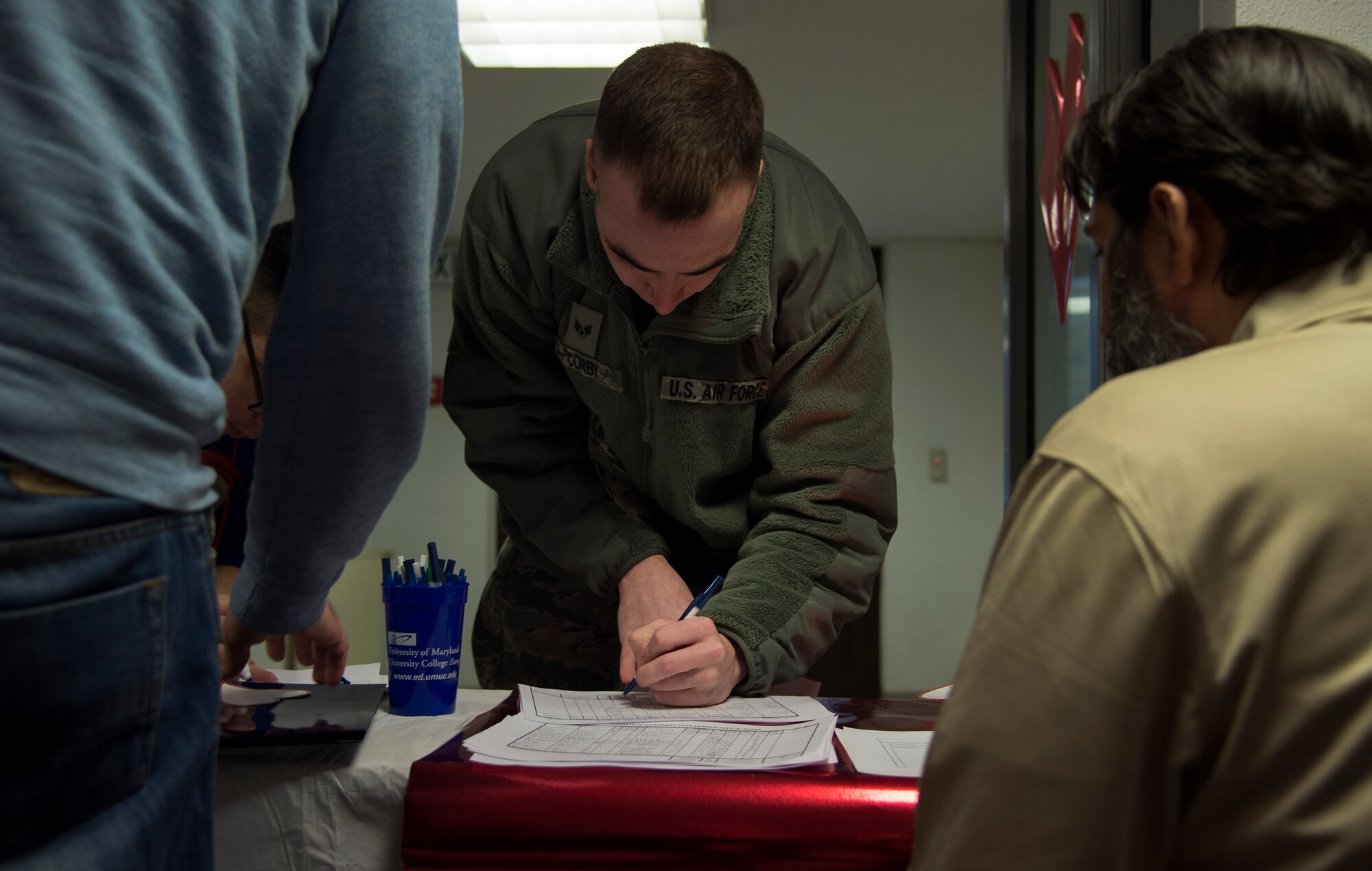 Senior Airman Jeffrey Corby, 786th Civil Engineer Squadron pest management journeyman, signs up for a CLEP during a CLEP-a-thon at Ramstein Air Base, Germany, Feb. 09, 2015. The CLEP-a-thon allows Airmen an opportunity to earn credits toward their Community College of the Air Force degree or any upper-level degree an individual may be working towards without having to schedule test dates weeks in advance. (U.S. Air Force photo/Senior Airman Damon Kasberg)