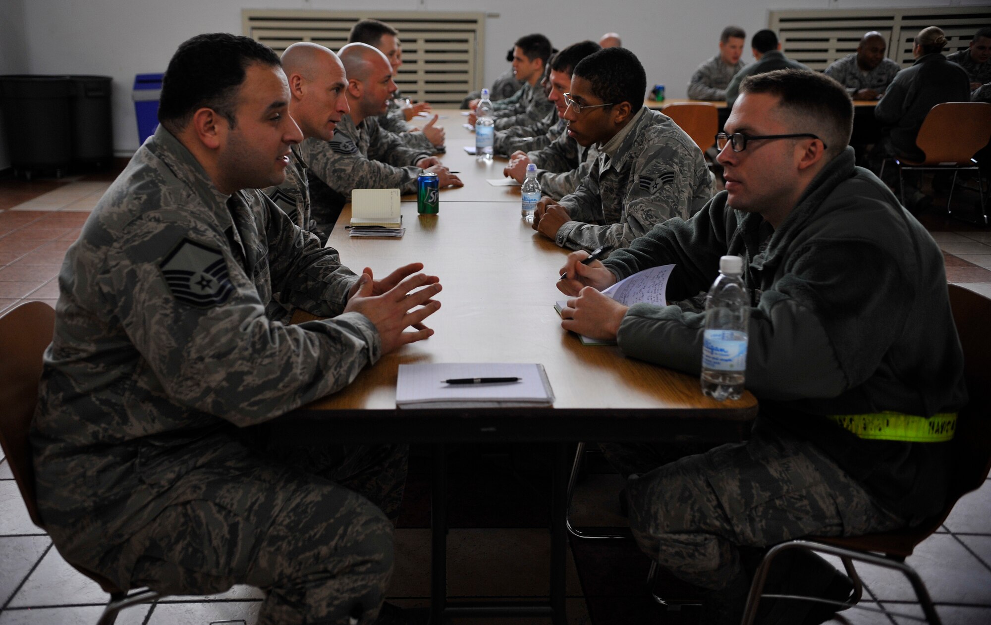 Airmen converse during a speed mentoring forum on Feb. 4, 2015 at the Northside Chapel Annex on Ramstein Air Base, Germany. Senior NCOs mentored junior enlisted members by answering questions, offering advice and sharing their experiences and knowledge. (U.S. Air Force photo/Airman 1st Class Larissa Greatwood)