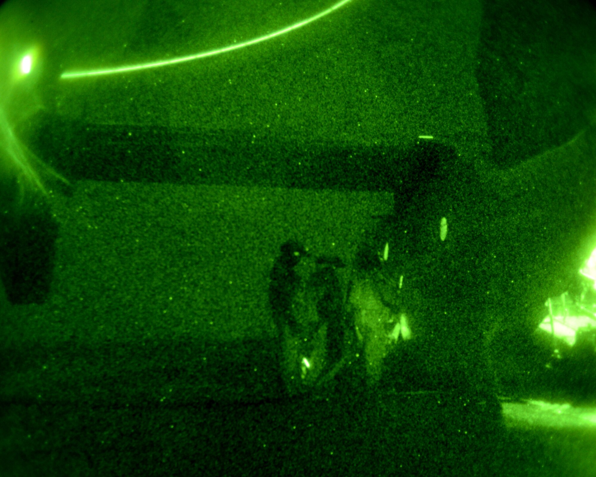 Fuels technicians assigned to the 100th Logistics Readiness Squadron Forward Area Refueling Point team and CV-22B Osprey flight engineers assigned to the 7th Special Operations Squadron refuel a CV-22B Osprey during FARP training Jan. 21, 2015, at RAF Sculthorpe, England. Utilized mostly in potentially hazardous areas, a FARP is the process of refueling aircraft on the ground from another parked aircraft. (U.S. Air Force photo by Senior Airman Kate Maurer/Released)