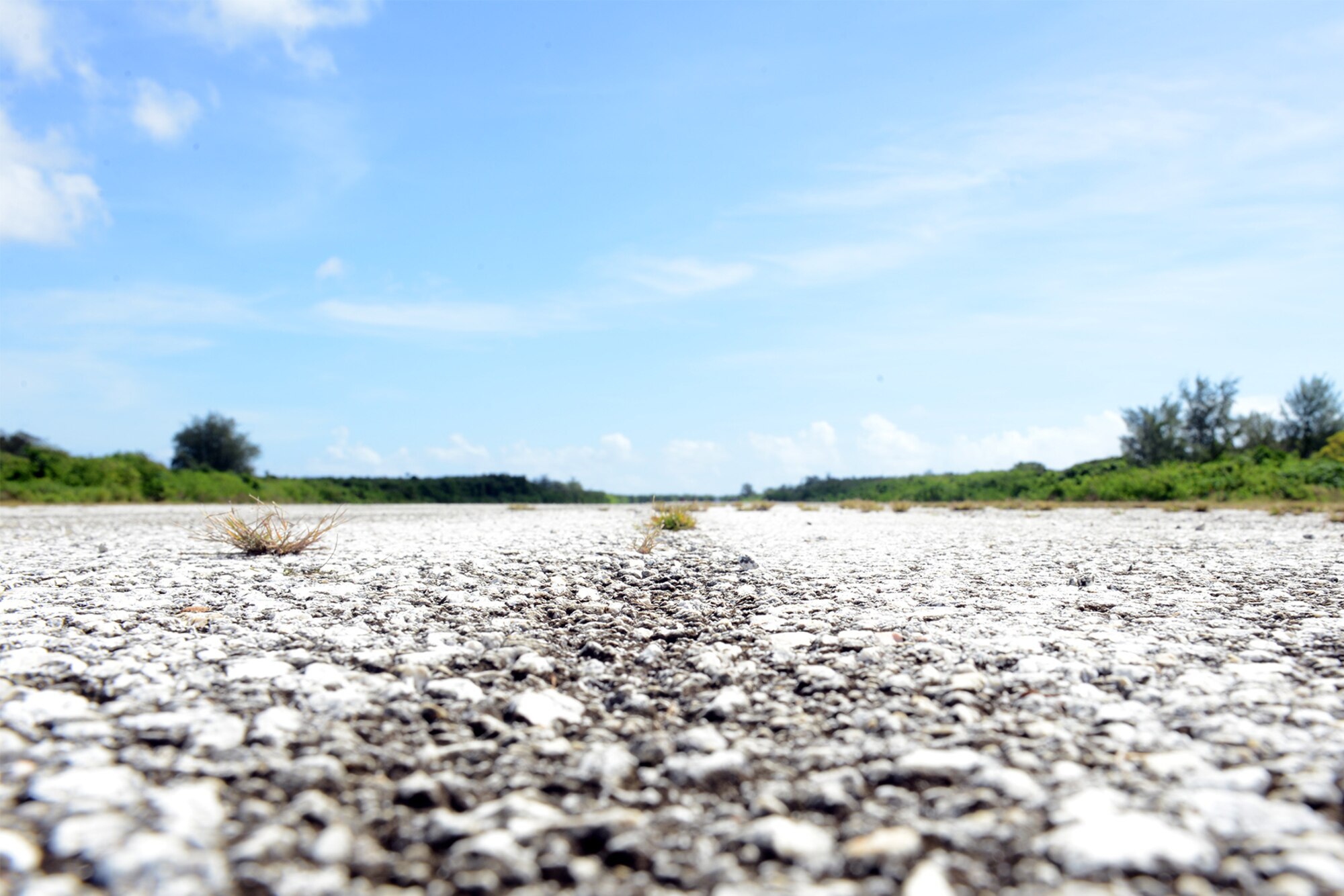 The centerline of Baker landing zone on Tinian, Marianas Islands Jan. 30, 2015. Pilots use centerline as a reference for landing for the safety of the aircraft, crew and equipment. (U.S. Air Force photo by Senior Airman Desiree Economides/Released)