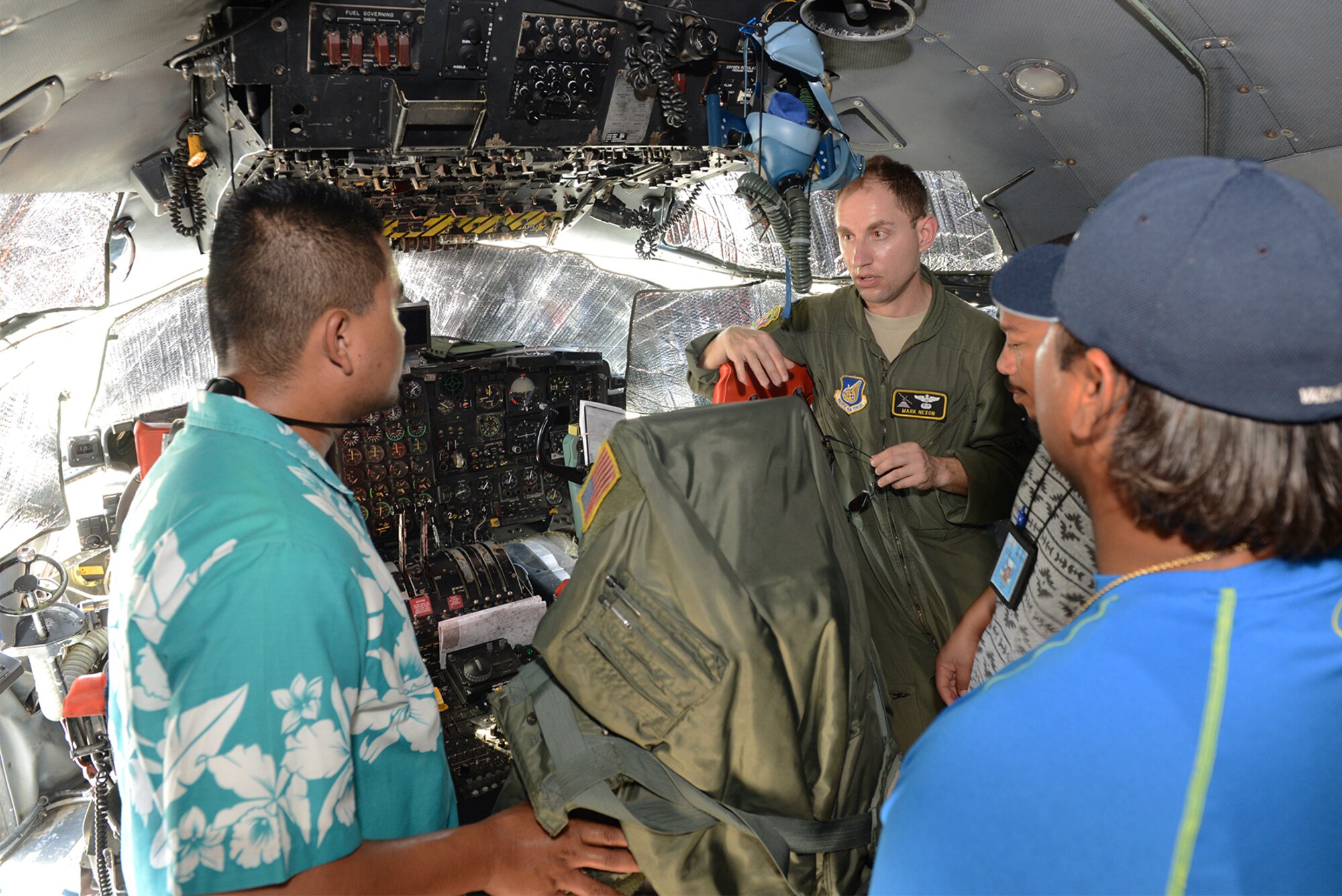 Capt. Mark Nexon, Cope North mission commander, speaks with local officials at Tinian International Airport Jan. 29, 2015. Several local and federal agencies have had to work together in preparations for Cope North 2015. (U.S. Air Force photo by Senior Airman Desiree Economides/Released)