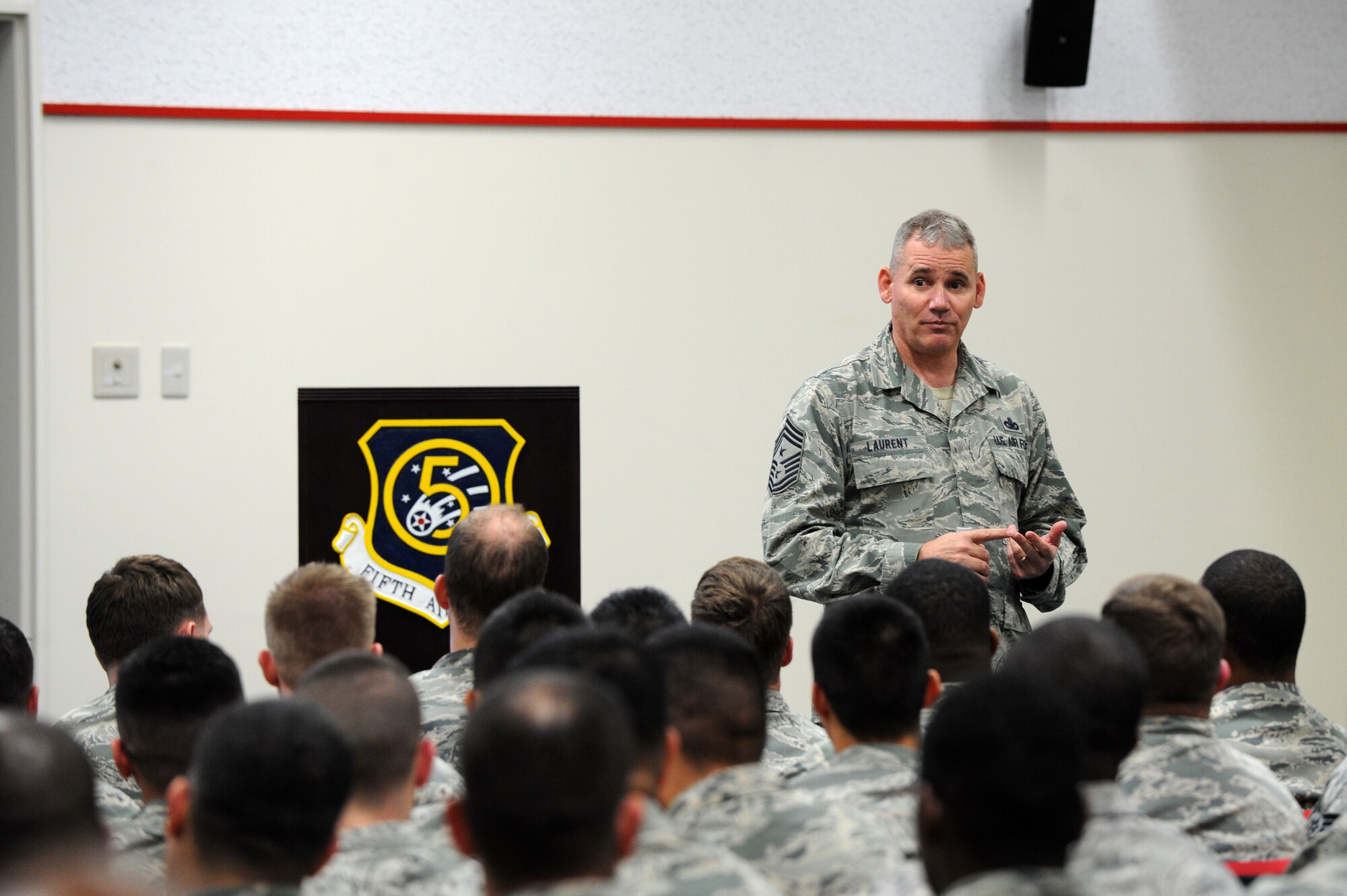 U.S. Air Force Chief Master Sgt. James Laurent, 5th Air Force command chief master sergeant, speaks to the current Airman Leadership School and non-commissioned officer academy attendees on Kadena Air Base, Japan, Feb. 5, 2015. During his visit Laurent met with and mentored Airmen from the different squadrons on Kadena discussing leadership and what it means to be an Airman in today’s Air Force. (U.S. Air Force photo by Airman 1st Class Stephen G. Eigel)
