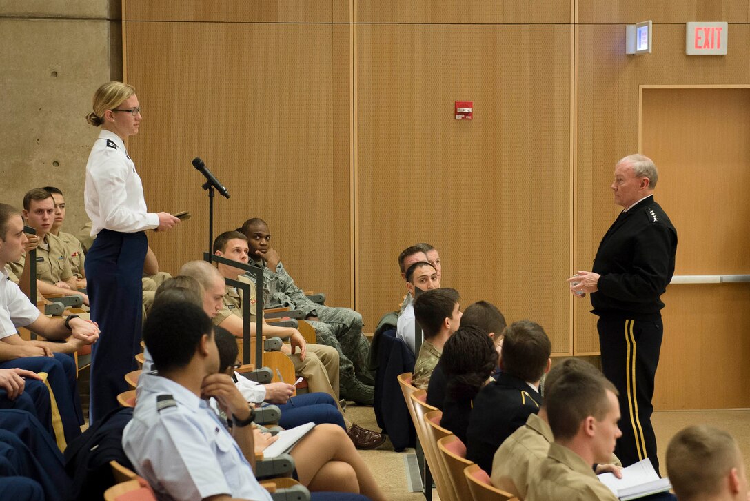 An ROTC cadet asks a question of Army Gen. Martin E. Dempsey, chairman of the Joint Chiefs of Staff, during a discussion with ROTC cadets from the University of North Carolina, Duke University and North Carolina State University during a visit to Chapel Hill, N.C., Feb. 7, 2015. 
