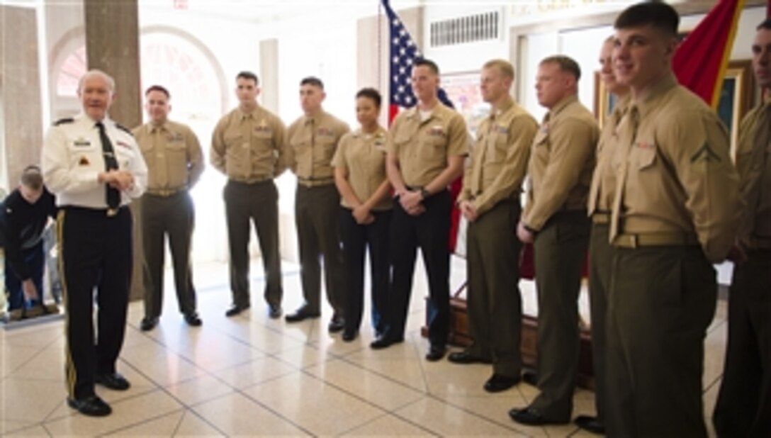 Army Gen. Martin E. Dempsey, chairman of the Joint Chiefs of Staff, talks with Marines and sailors assigned to the 2nd Marine Expeditionary Force during a visit on Camp Lejeune, N.C., Feb. 6, 2015. 