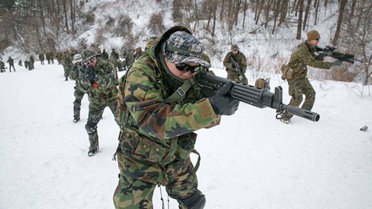 Republic of Korea and U.S. Marines perform pivot drills during Korean Marine Exchange Program 15-4 Feb. 5 at the Pyeongchang Winter Training Facility, Pyeongchang, Republic of Korea. This training ensured that the ROK and U.S. Marines’ understanding of each other’s combat tactics is at the highest level possible. The overarching goal of the KMEP is to enhance and improve the interoperability of ROK and U.S. Marine Corps forces. The ROK Marines are with 1st Reconnaissance Battalion, 1st ROK Marine Division. The U.S. Marines are with Company L, 3rd Battalion, 3rd Marine Regiment, currently assigned to 4th Marine Regiment, 3rd Marine Division, III Marine Expeditionary Force under the unit deployment program. (U.S. Marine Corps photo by Pfc. Cedric R. Haller II/Released)