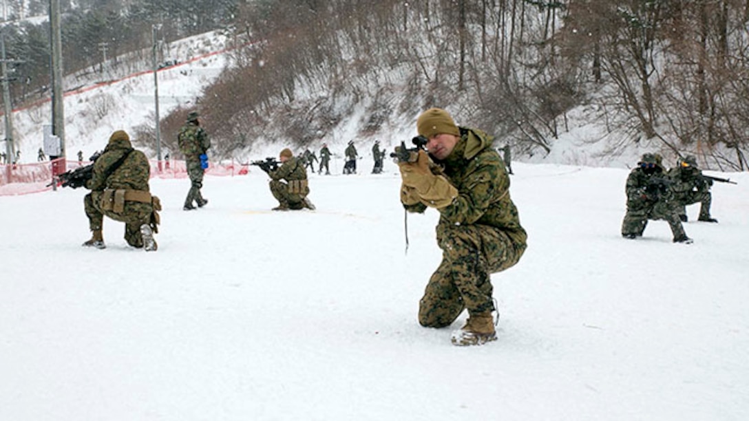 Republic of Korea and U.S. Marines train for tactical patrols during Korean Marine Exchange Program 15-4 Feb. 5 at the Pyeongchang Winter Training Facility, Pyeongchang, Republic of Korea. Cohesiveness, interoperability and comprehension all play a vital role should the ROK and U.S. Marines need to work together during any future operation, according to U.S. Marine Staff Sgt. Donald J. Leek, platoon sergeant with Company L, 3rd Battalion, 3rd Marine Regiment, currently assigned to 4th Marine Regiment, 3rd Marine Division, III Marine Expeditionary Force under the unit deployment program. KMEP is a regularly scheduled, bilateral, small-unit training exercise, which enhances the combat readiness and interoperability of ROK and U.S. Marine Corps’ forces. The ROK Marines are with 1st Reconnaissance Battalion, 1st ROK Marine Division. The U.S. Marines are with Company L, 3rd Bn., 3rd Marines, currently assigned to 4th Marines, 3rd Marine Division, III MEF under the unit deployment program. (U.S. Marine Corps photo by Pfc. Cedric R. Haller II/Released)