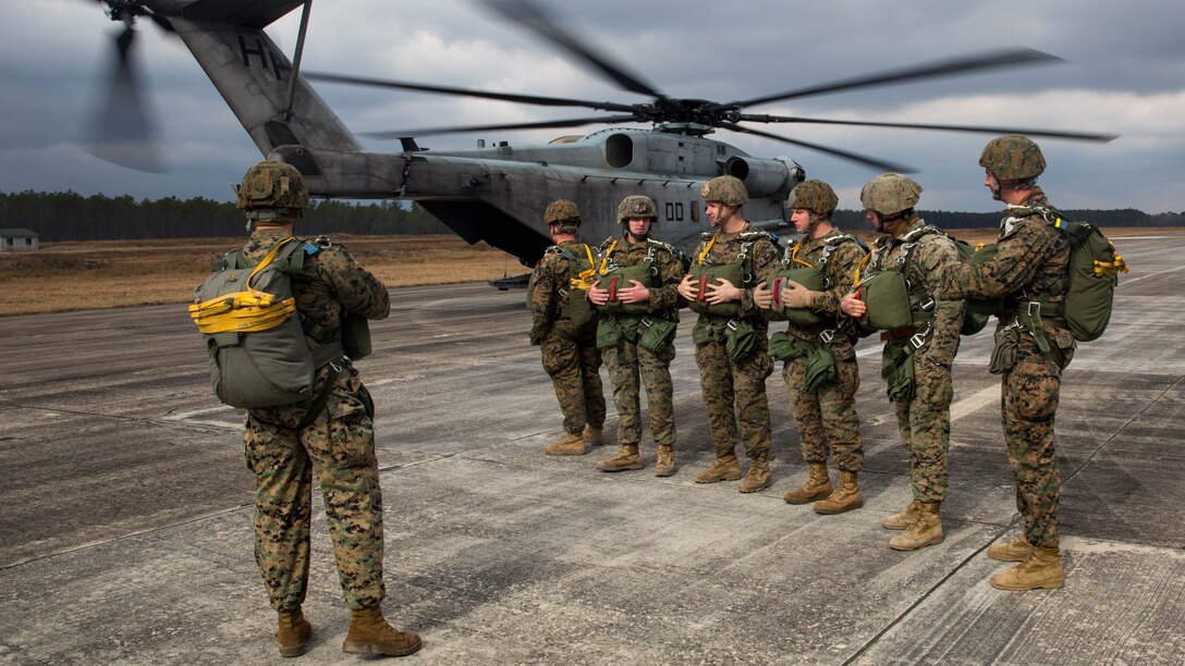 Marines with 2nd Reconnaissance Battalion, 2nd Marine Division, prepare to board a CH-53E Super Stallion to perform a low-level static line jump during a parachute training exercise at Training Landing Zone Pheasant, aboard Camp Lejeune, N.C., Jan. 27. The battalion conducted a three-day training exercise to refresh their parachuting skills and to get their new Marines accustomed to the low-level static line parachute used by the Marine Corps. Marines performed two different types of jumps; low-level static line, with and without equipment, and High Altitude Low Opening free-fall jumps. 
