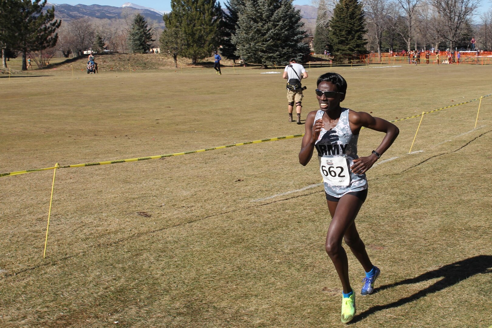 Army Spc. Caroline Jepleting from Landstuhl, Germany preparing to cross the finish line to win the 2015 Armed Forces Championship.