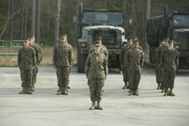 Marines with Marine Air Ground Task Force Materiel Distribution Company stand in formation during the company’s activation ceremony, Feb. 9, 2015, aboard Camp Lejeune, North Carolina. The company has been created within 2nd Supply Battalion, Combat Logistics Regiment 25, 2nd Marine Logistics Group, to establish a proof of principle on the reorganization of intermediate supply and distribution capabilities in order to provide tailored capabilities to units deploying in support of II Marine Expeditionary Force. This new company will be comprised of some preexisting platoons from Supply Company, as well as a motor transportation capability from the Headquarters and Support Company and an additional 30 Marines to form Distribution Liaison Cells. (U.S. Marine Corps photo by Cpl. Elizabeth A. Case/Released)