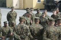 Brig. Gen. Charles G. Chiarotti, Commanding General, 2nd Marine Logistics Group, speaks with Marines with Marine Air Ground Task Force Materiel Distribution Company following the company’s activation ceremony, Feb. 9, 2015, aboard Camp Lejeune, North Carolina. The company has been created within 2nd Supply Battalion, Combat Logistics Regiment 25, 2nd Marine Logistics Group, to establish a proof of principle on the reorganization of intermediate supply and distribution capabilities in order to provide tailored capabilities to units deploying in support if the II Marine Expeditionary Force. This new company will be comprised of some preexisting platoons from Supply Company, as well as a motor transportation capability from the Headquarters and Support Company and an additional 30 Marines to form Distribution Liaison Cells. (U.S. Marine Corps photo by Cpl. Elizabeth A. Case/Released)