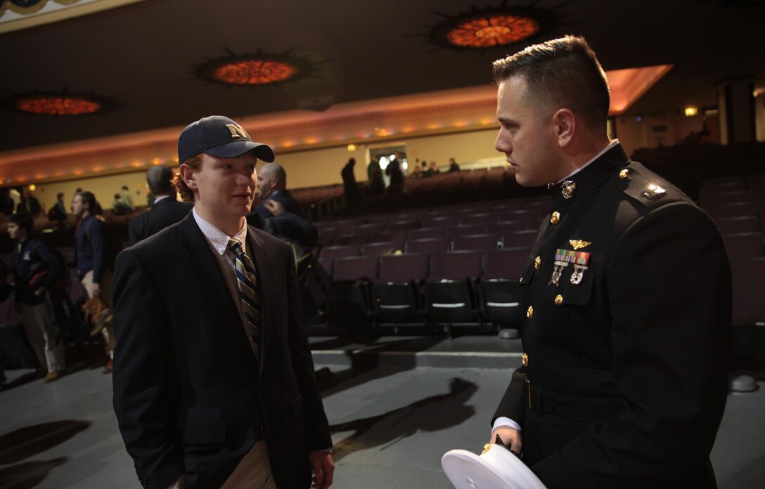 BUFFALO, NY – (Right) Marine Capt. Michael A. Kelly takes a moment to speak with Matt McCraith during a visit to the high school, Feb. 4. Kelly spoke to McCraith about life in the military and his days at the Academy, reflecting on many fond memories. McCraith is a Canisius high School student recruited to play for the U.S. Naval Academy Soccer Team. Kelly is the operations officer for Marine Corps Recruiting Station Buffalo and U.S. Naval Academy graduate. (Official U.S. Marine Corps photo by Sgt. Christopher O’Quin/Released)