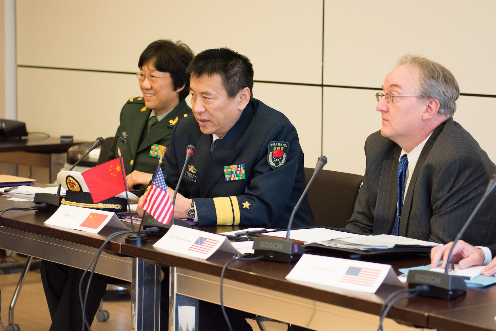 From right: Dr. Phillip Saunders, Distinguished Research Fellow, INSS, and Director, Center for the Study of Chinese Military Affairs; Rear Admiral Li Ji, Deputy Director, Foreign Affairs Office, Ministry of National Defense, People’s Republic of China; and an unnamed officer.