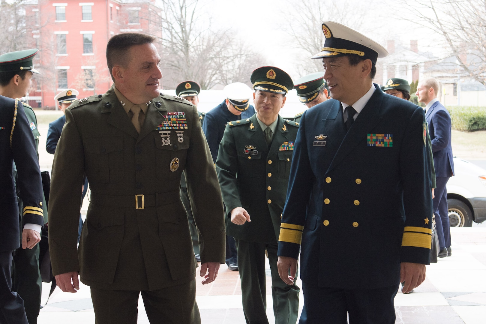 NDU President Major General Frederick Padilla, USMC, greets Rear Admiral Li Ji, Deputy Director, Ministry of National Defense Foreign Affairs Office of the People's Republic of China. 