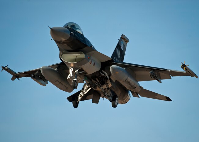 An F-16 Fighting Falcon assigned to the 64th Aggressor Squadron approaches the runway for landing during Red Flag 15-1 at Nellis Air Force Base, Nev., Feb. 5, 2015. Red Flag missions are conducted on the 2.9 million acres Nevada Test and Training Range with 1,900 possible targets, realistic threat systems and opposing enemy forces, including aggressors from the 64th AGRS. (U.S. Air Force photo by Staff Sgt. Siuta B. Ika)